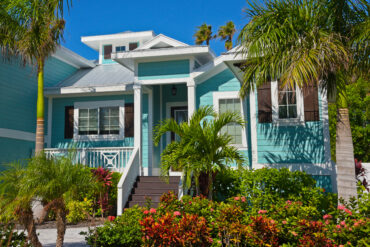 Beautiful,New,Florida,House,With,Palm,Trees,And,Landscaping,Near