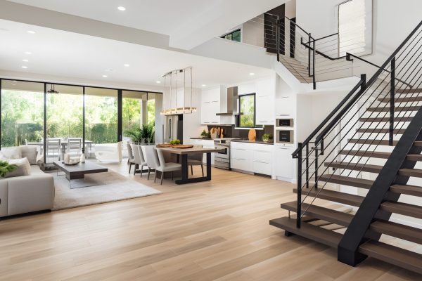Stylish spacious kitchen and living room with refrigerator and w Stylish spacious kitchen and living room with refrigerator and w